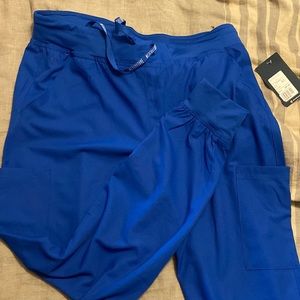 Medcouture insight jogger blue scrubs. Too big and forgot to return in time